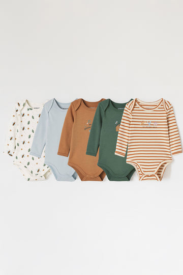 Set of five baby bodysuits in various colors on a white background