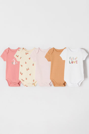 Five baby bodysuits in various colors and patterns on a white background