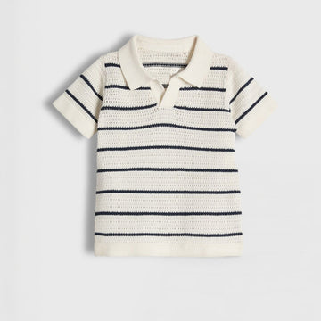 Striped knitted shirt on a light gray background