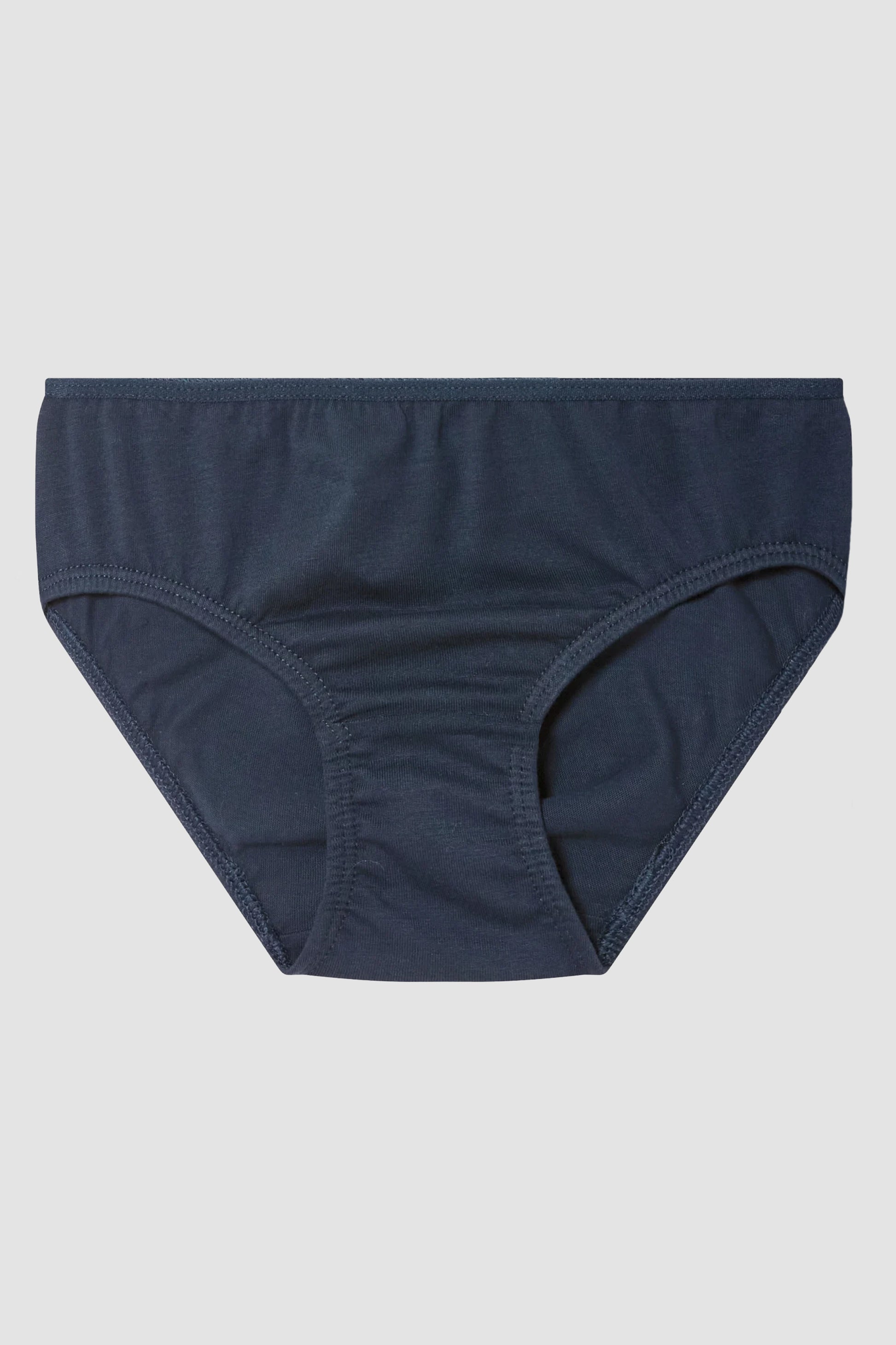 Navy blue girl's underwear on a light gray background