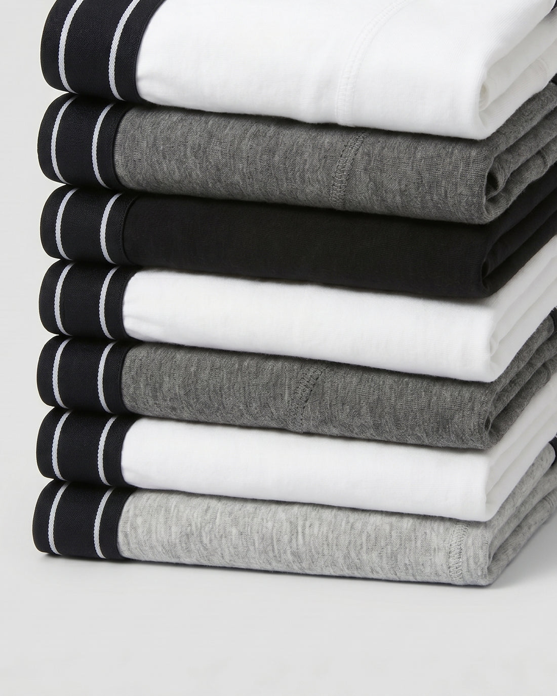 Boys' soft cotton boxer briefs 7-piece pack laid out in black, grey and white