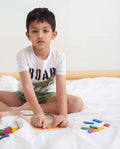 a boy wearing a 2-Piece Printed Cotton T-Shirt & Short Set