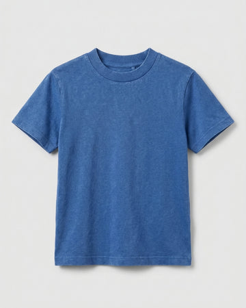 Flat lay of a boy's blue acid wash crew neck T-shirt with short sleeves and a relaxed fit, displayed on a light grey background.