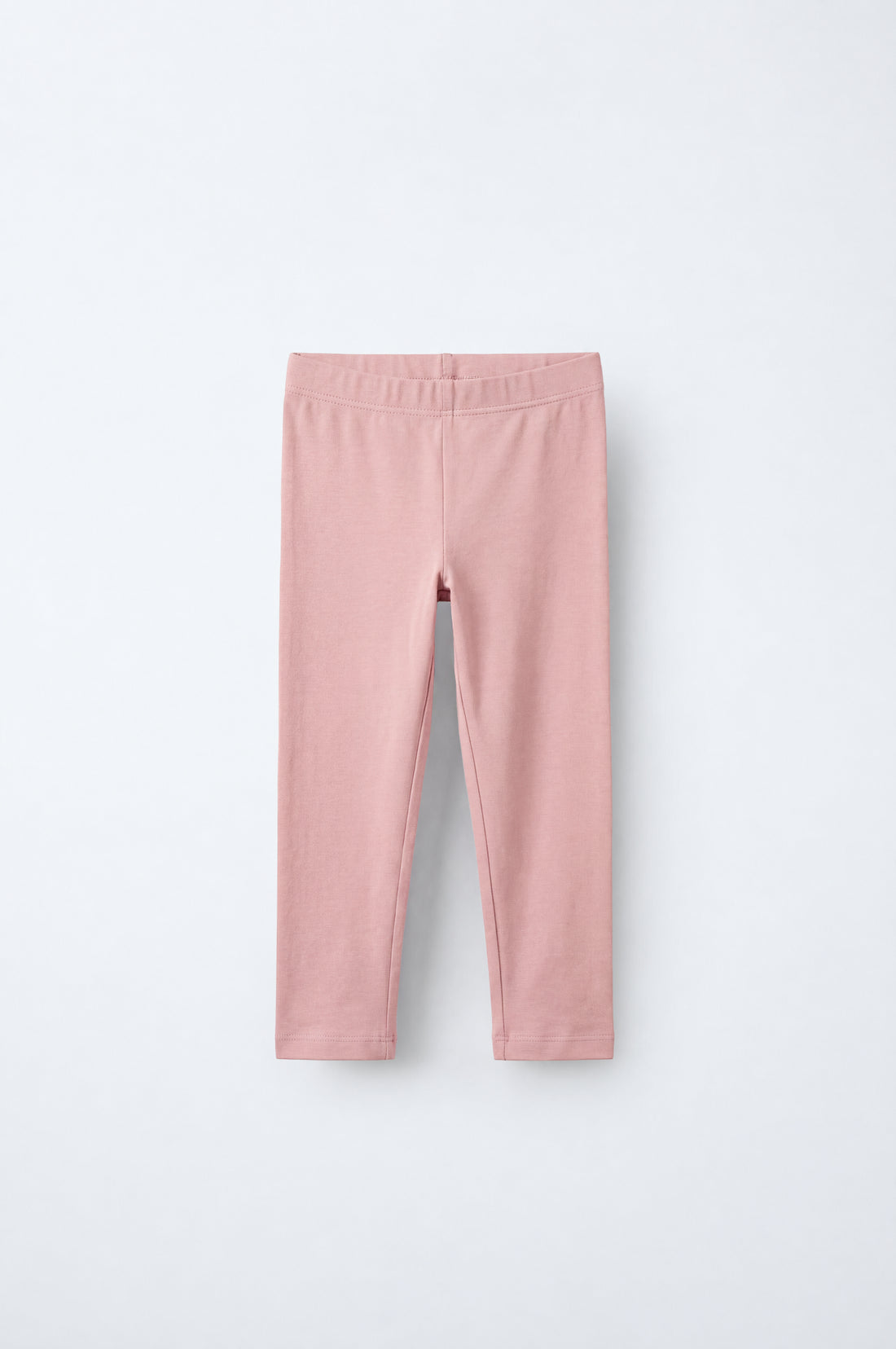 Baby girls warm rosy pink leggings with elasticated waistband, slim tapered legs and neatly stitched ankle hems.