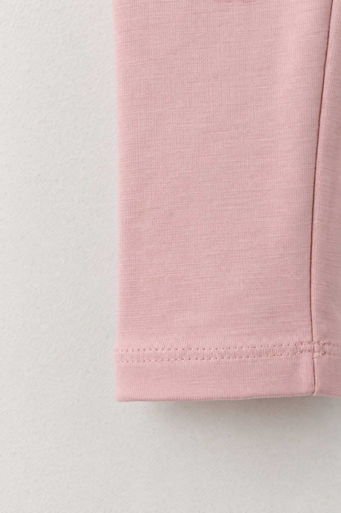 Baby girls warm rosy pink leggings with elasticated waistband, slim tapered legs and neatly stitched ankle hems.