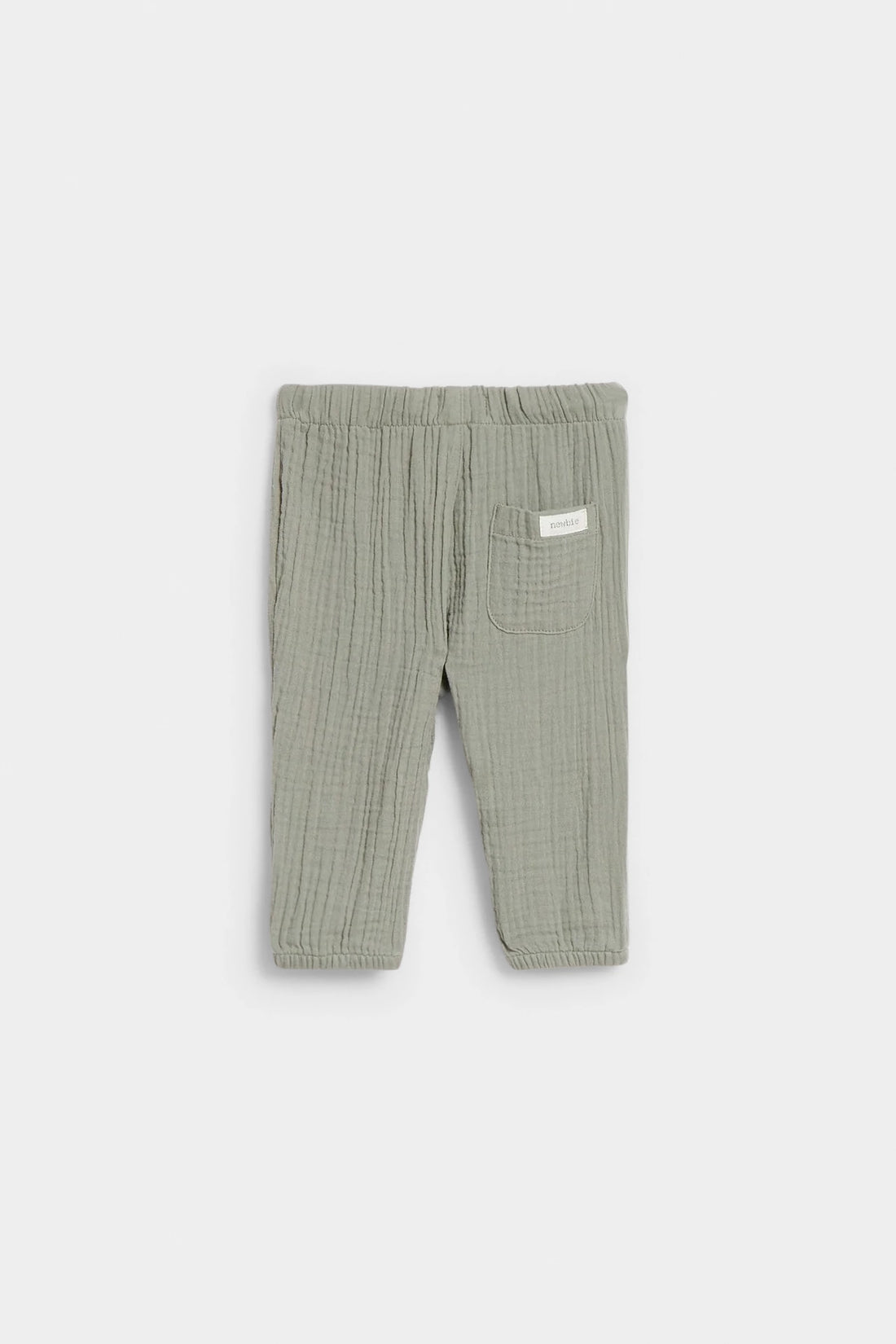 Sage green baby muslin drawstring trousers with elasticated waist and ankle cuffs, flat lay — PTex Fashion