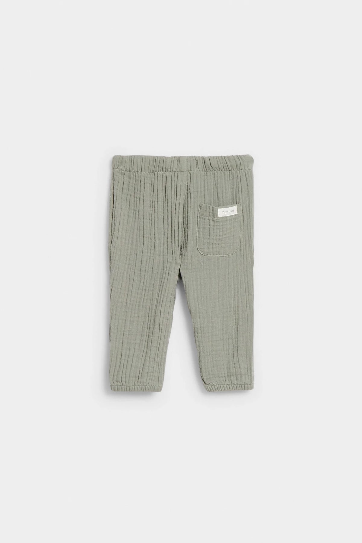 Back view of sage green baby muslin trousers showing patch pocket and elasticated waist — PTex Fashion