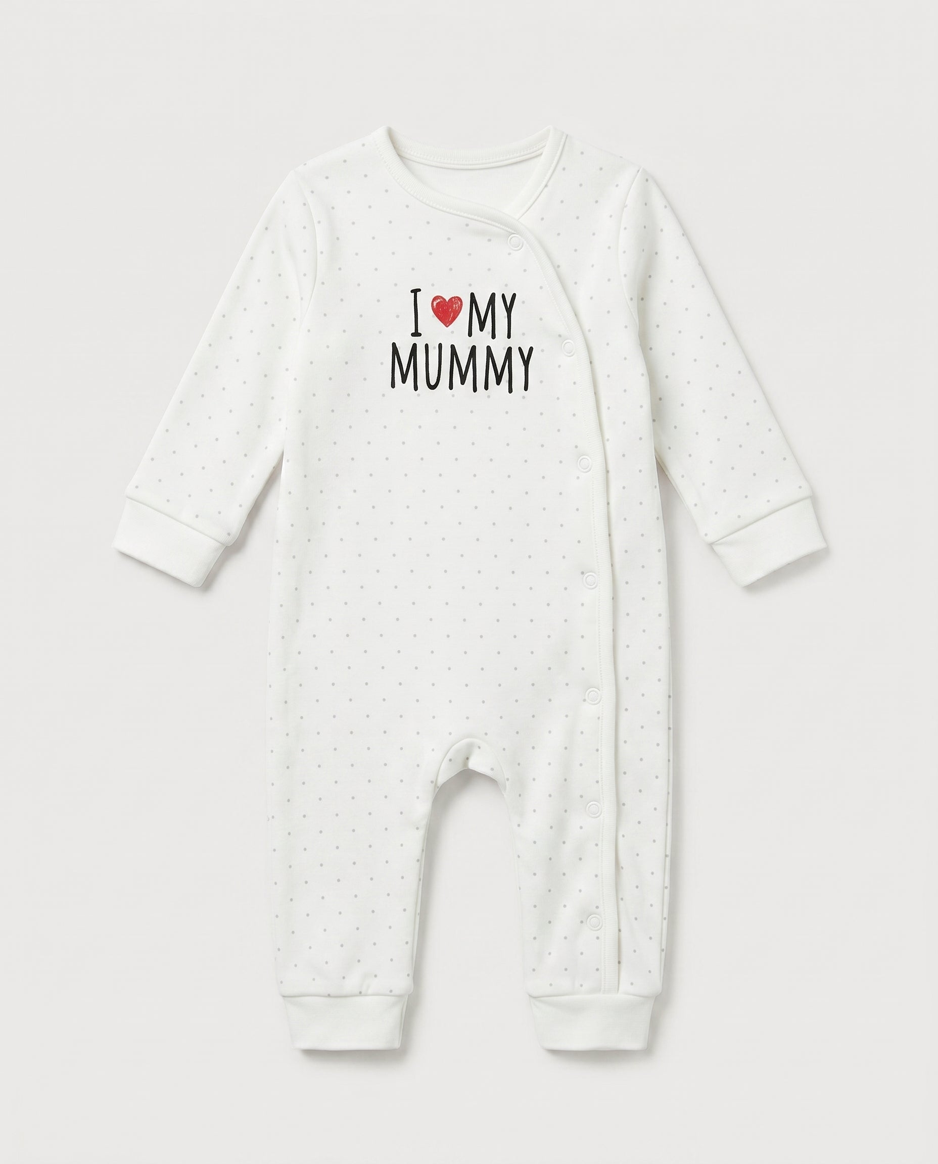 Ivory baby long-sleeve romper with grey polka dot print and "I Love My Mummy" chest graphic with red heart, featuring side snap button closure and ribbed cuffs at wrists and ankles