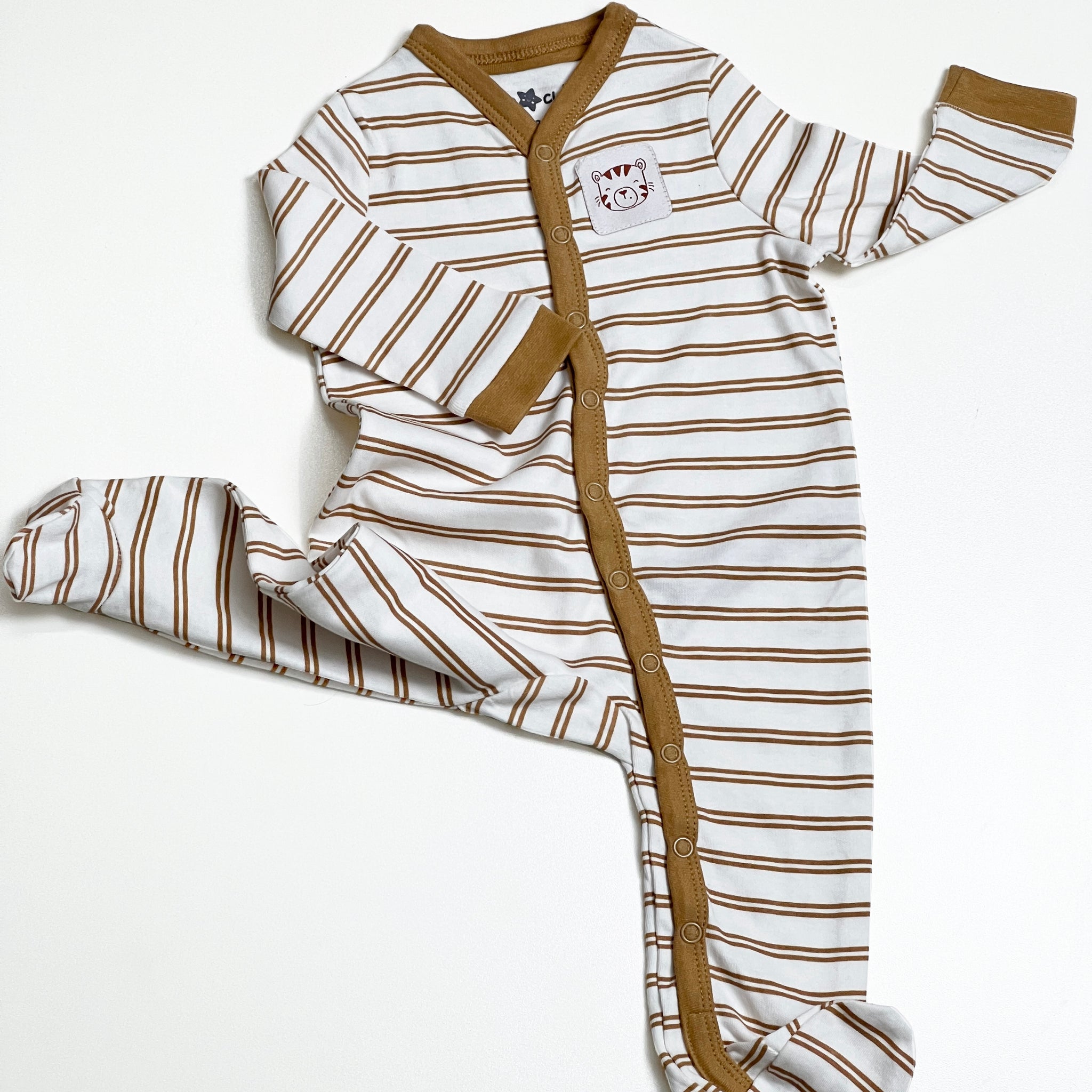 Baby Rompers Dress with attached footwear in stripped pattern and off white color.