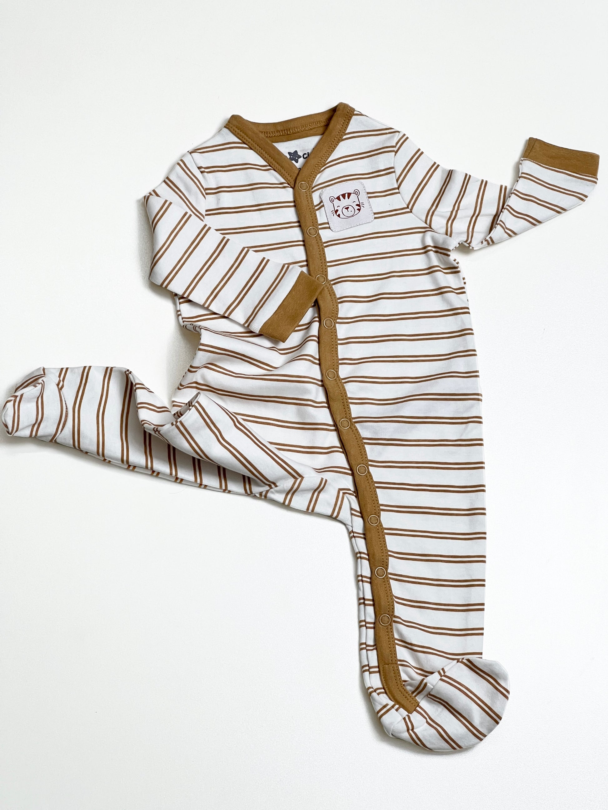 Baby Rompers Dress with attached footwear in stripped pattern and off white color.