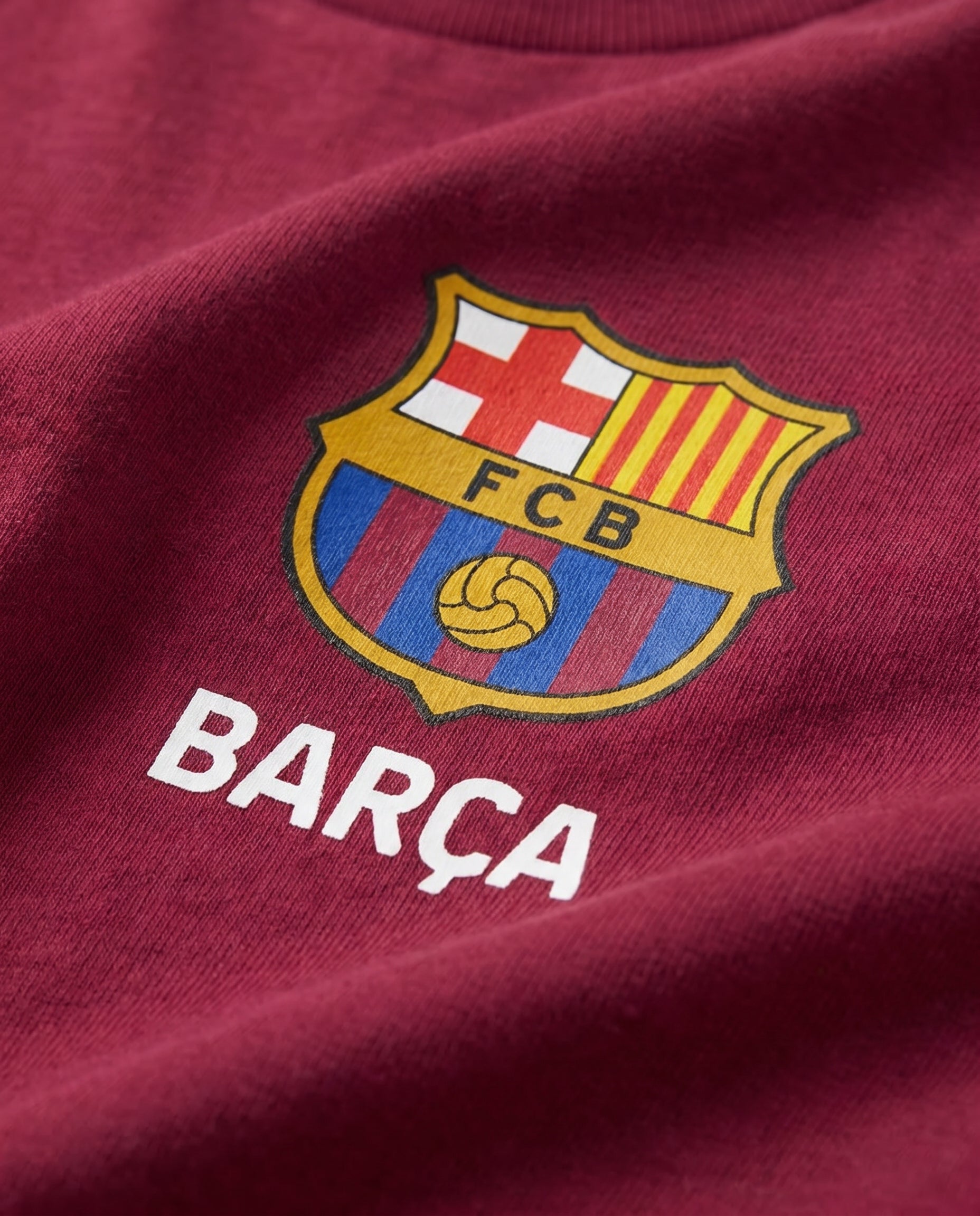 close look Baby and toddler burgundy short-sleeve t-shirt with official FC Barcelona crest and Barça wordmark