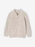 Beige knitted sweater with a zipper on a white background