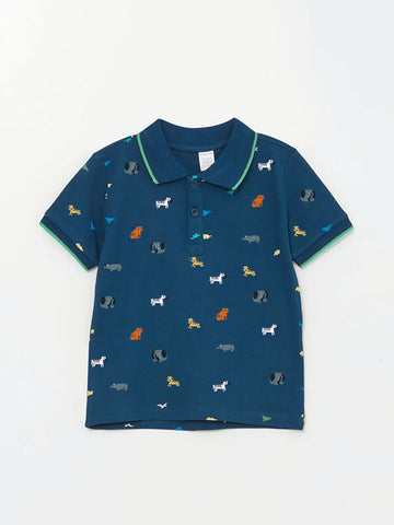 Blue polo shirt with dog pattern on a white background