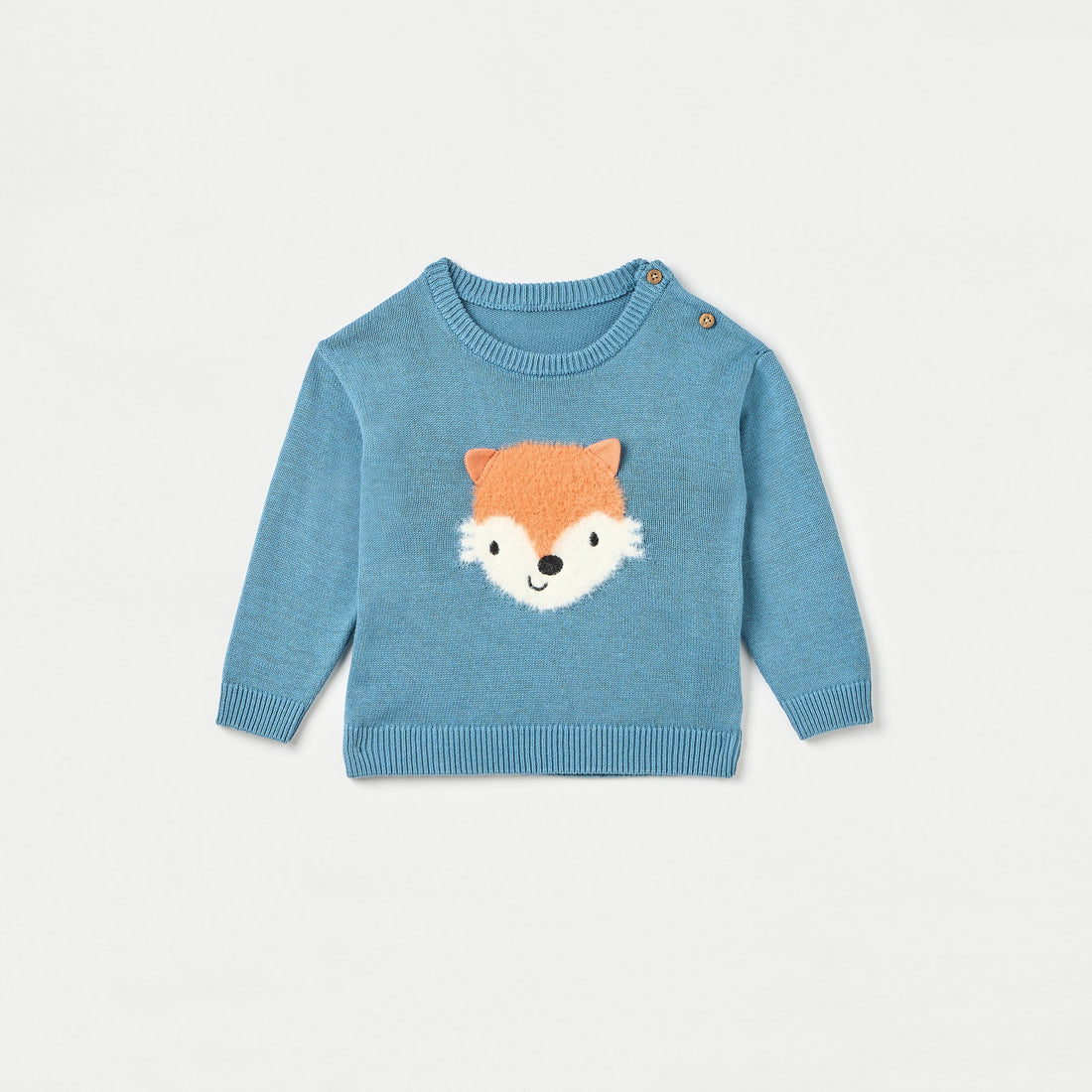 Blue sweater with fox face design on a light gray background