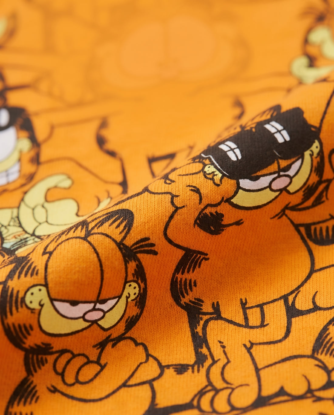 Boys' orange short-sleeve t-shirt with all-over Garfield comic cat print