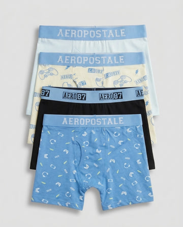 Pack of 4 boys' premium cotton boxer briefs in sky blue gamer print, lime cream controller print, solid black, and powder mint, fanned out flat lay
