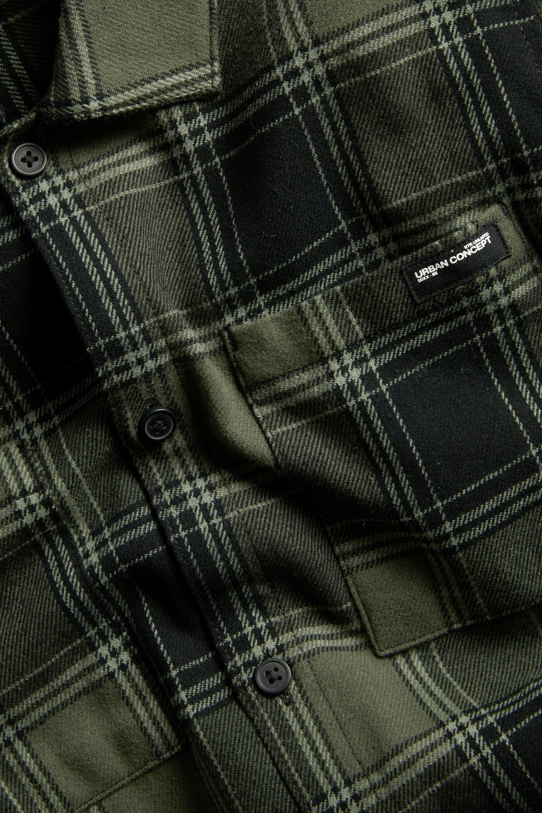 PTex Fashion boys' olive and black brushed flannel check overshirt with point collar and two chest pockets, flat-lay front view