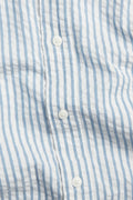 PTex Fashion striped seersucker shirt, close-up of button placket and fabric texture