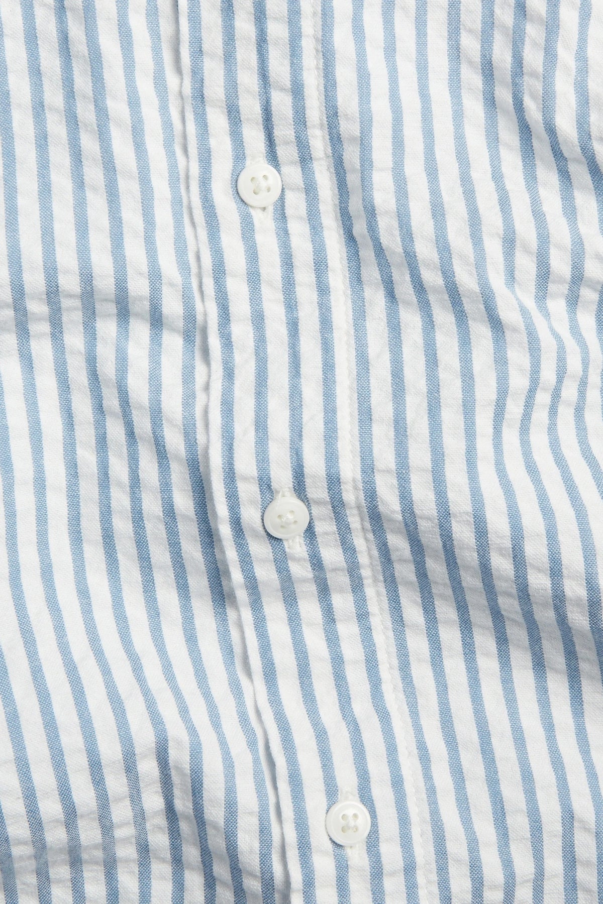 PTex Fashion striped seersucker shirt, close-up of button placket and fabric texture