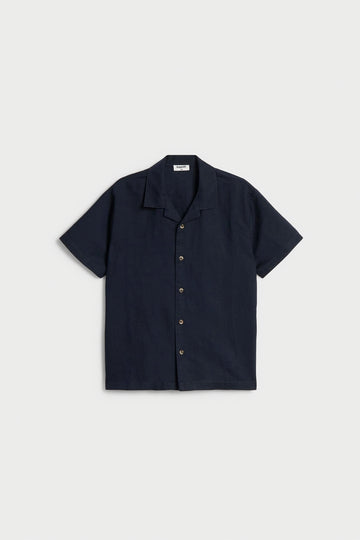 Boys navy linen blend half sleeve shirt with open collar, short sleeves and button-front design.