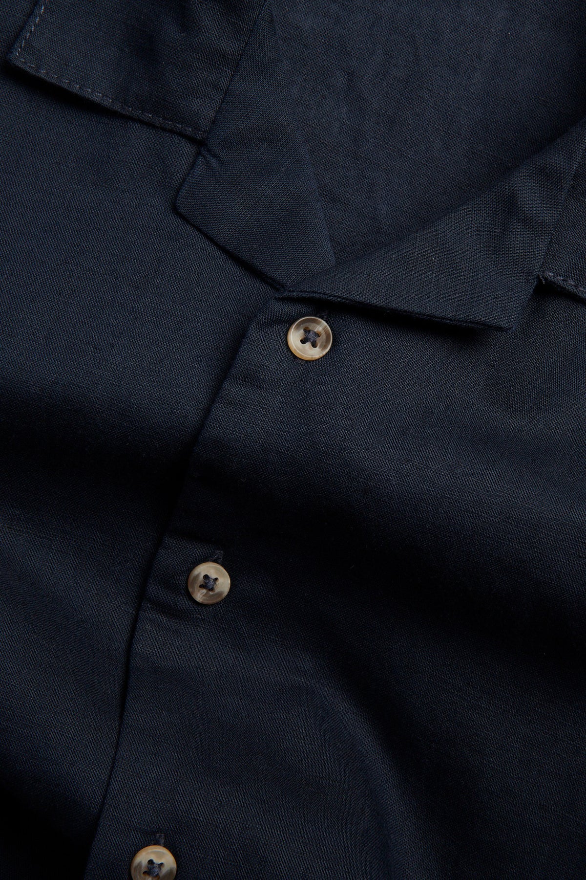 Boys navy linen blend half sleeve shirt with open collar, short sleeves and button-front design in macro image