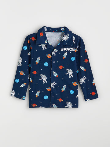 Children's shirt with space-themed print on a white background