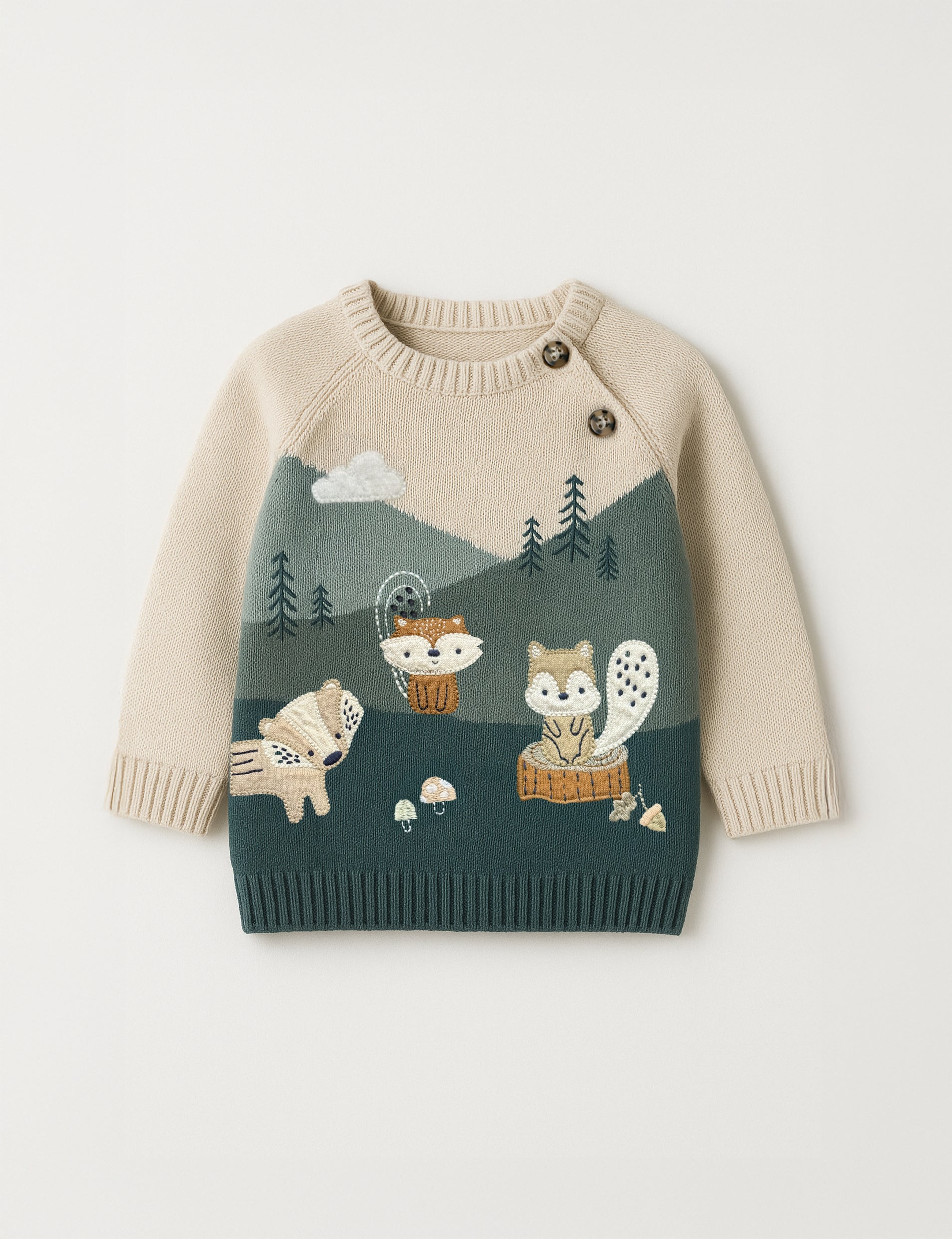 Children's sweater with forest design and animals on a light gray background