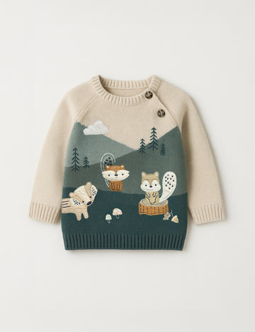 Children's sweater with forest design and animals on a light gray background