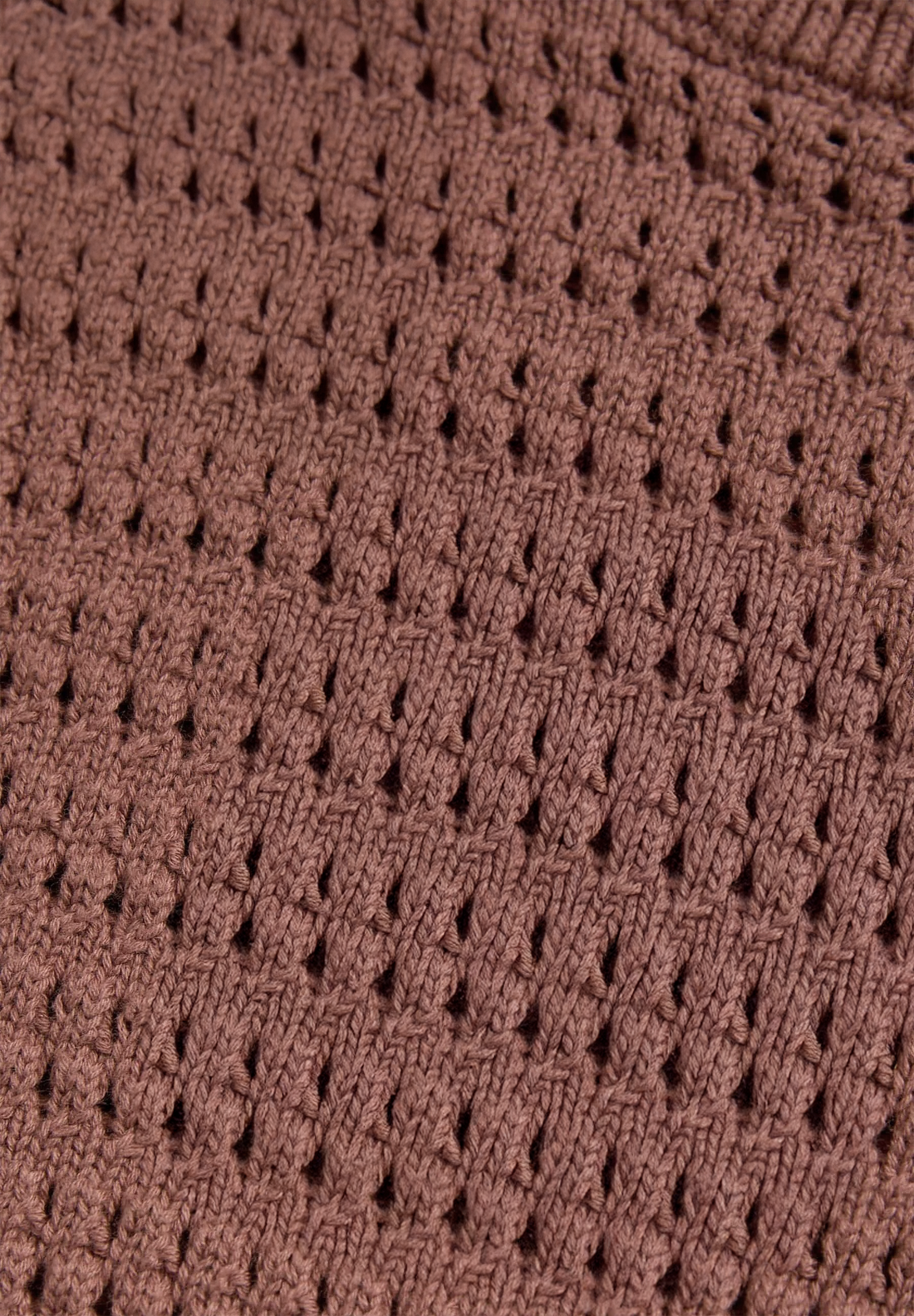 Brown crochet top on a white background