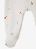 White baby blanket with small animal prints on a white background