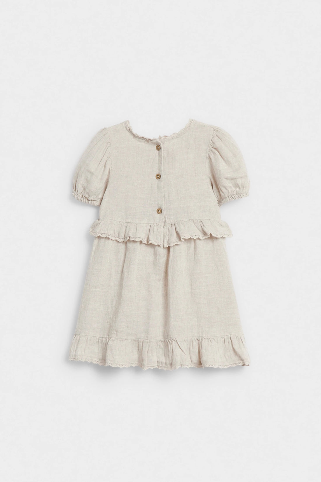 Front view of girls’ beige linen ruffle dress with puff sleeves and tiered hem