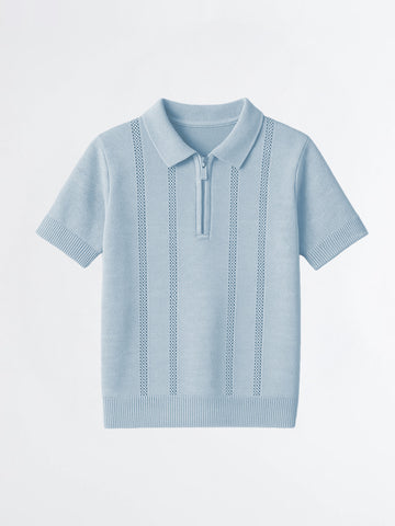 Light blue knitted polo shirt on a light gray background