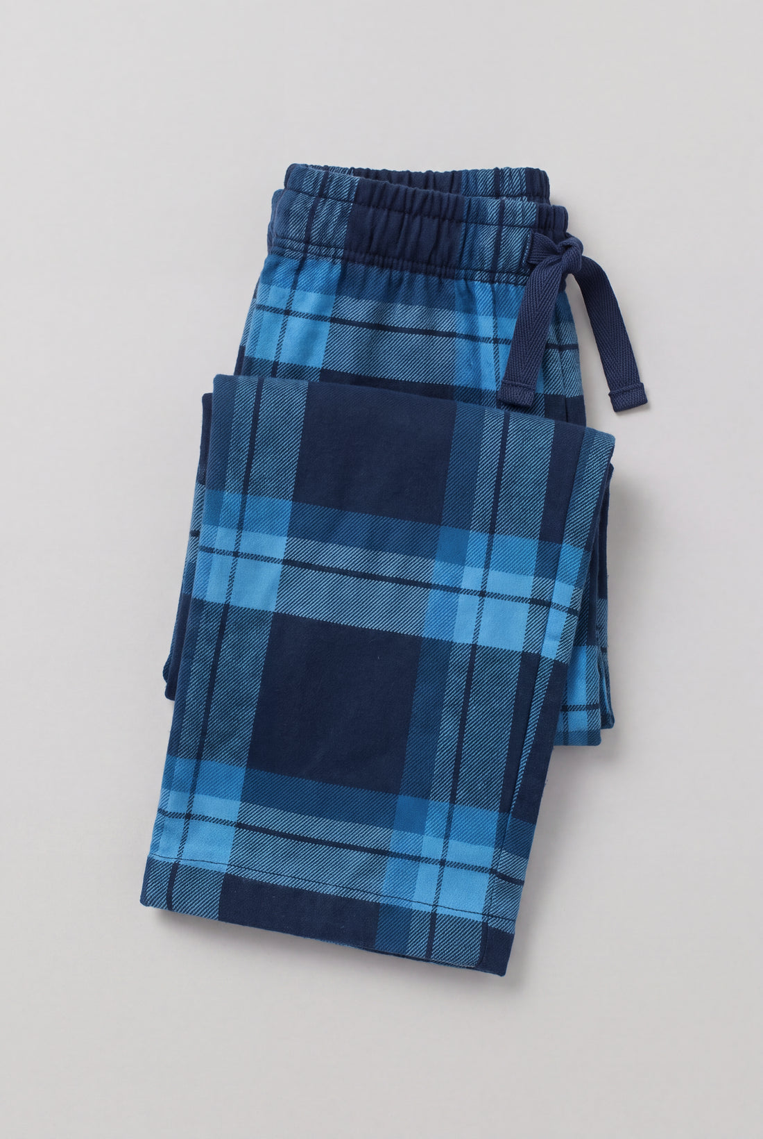 PTex Fashion boys’ navy and blue check flannel pants, front flat lay with elastic drawcord waist and straight leg