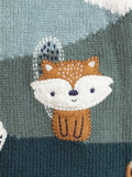 Knitted sweater with a fox design on a knitted background