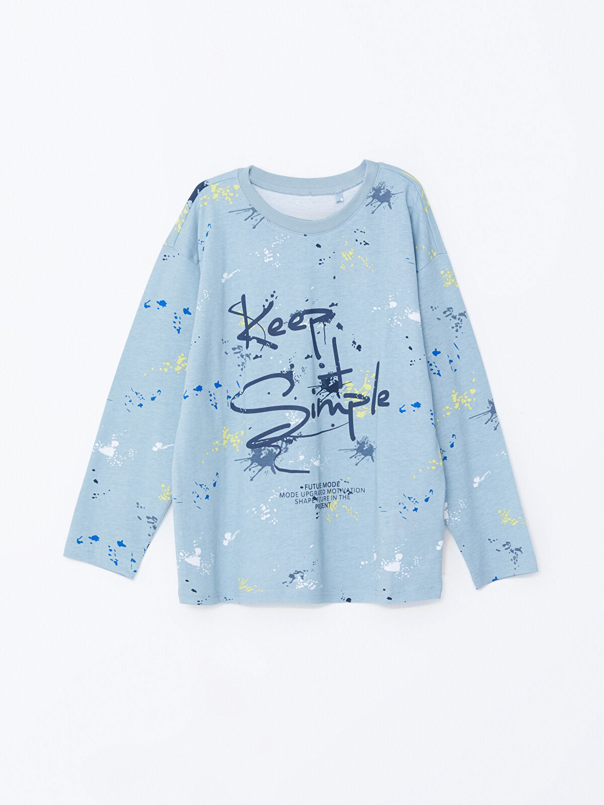 Light blue long-sleeve shirt with text and abstract patterns on a white background