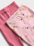 Pack of 2 cotton fabric leggings with plain and all over print close  look