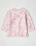 Pink and white knitted jumper on a light gray background