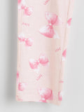 Pink cotton leggings  with bow and 'love' print on a light gray background