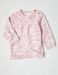 Pink knitted sweater on a white background