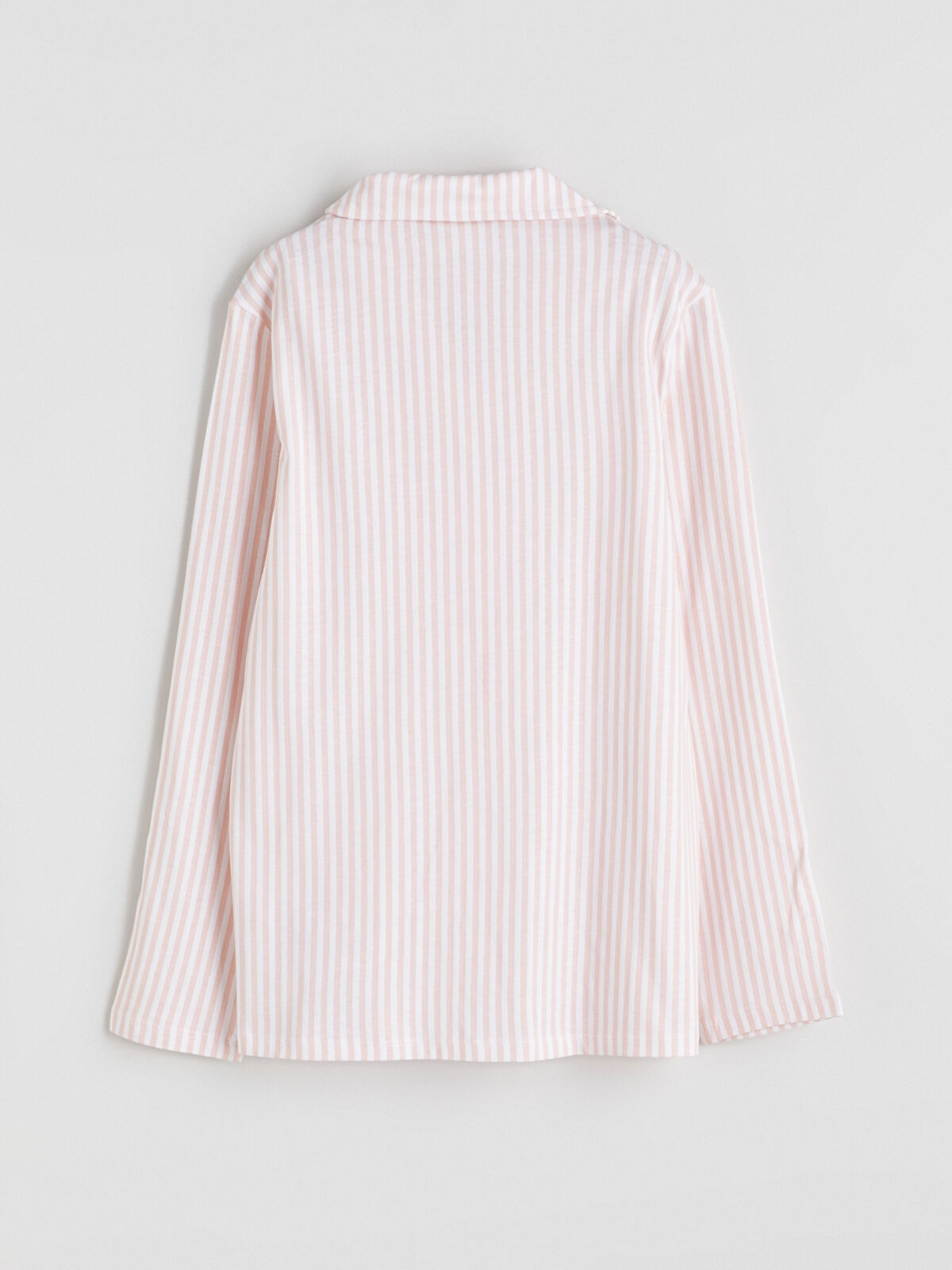 Pink striped shirt on a light gray background