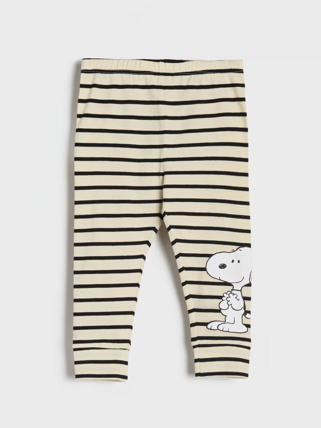 Striped leggings with a cartoon character on a white background