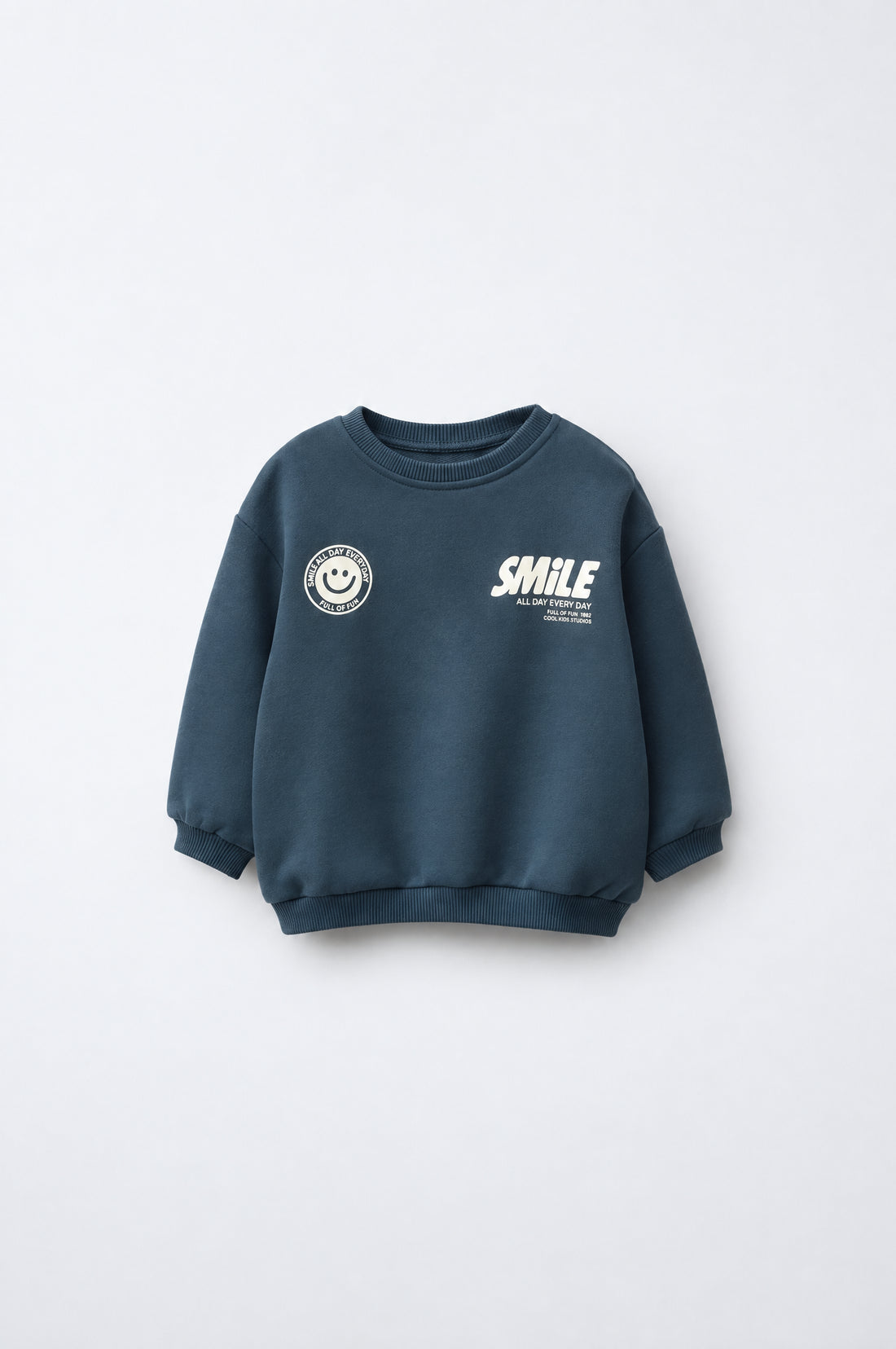 Toddler navy blue drop shoulder sweatshirt with off-white SMiLE front and oversized back graphic print.