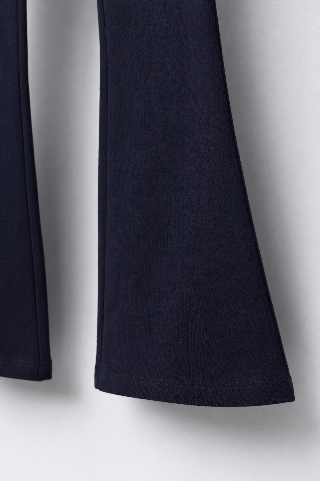 PTex Fashion toddler girls' dark navy blue plain cotton flared leggings with elastic waistband, flat lay