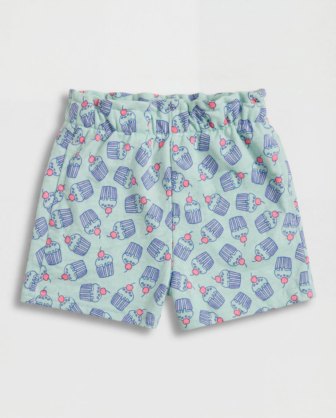 Front flat-lay view of girl's mint green short pant with all-over purple cupcake and coral cherry print and ruched paperbag elasticated waistband