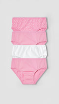 Set of four pairs of girl's underwear with different patterns on a light gray background