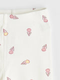 White fabric with pink floral patterns on a white background