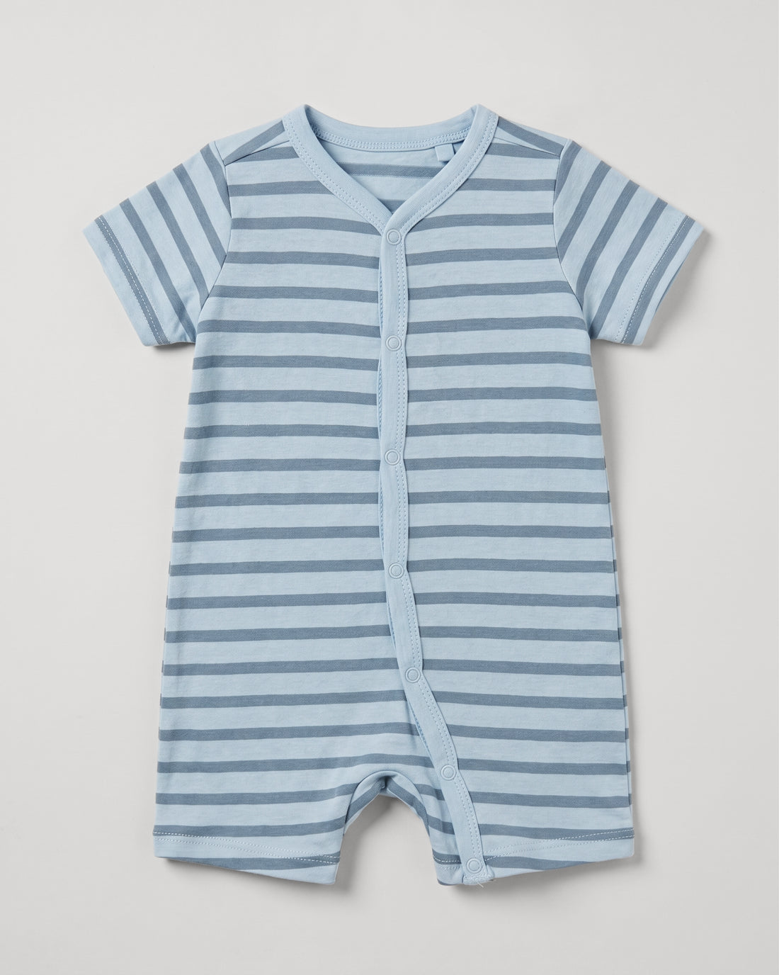 Dusky blue and slate stripe short-sleeve baby romper with diagonal snap button front, flat lay on white background