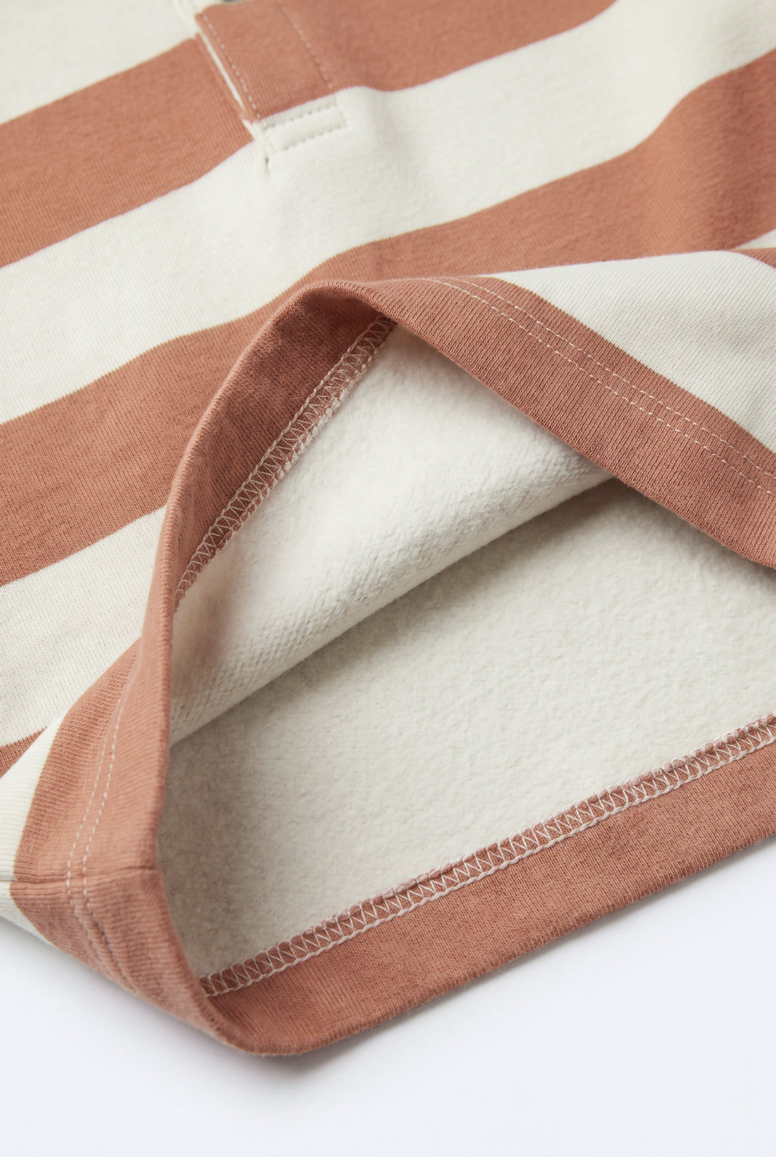 PTex Fashion baby striped polo sweatshirt in rust orange and cream, front view