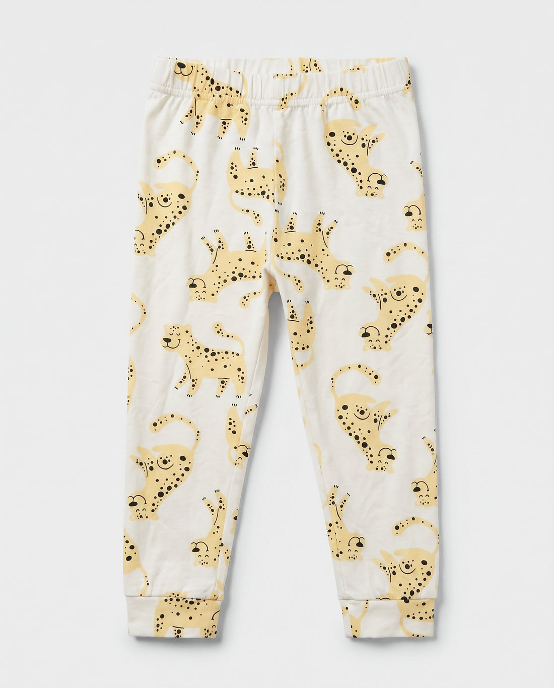 Baby cotton leggings in off-white with all-over yellow spotted animal print, elasticated waistband and ribbed ankle cuffs, flat lay view