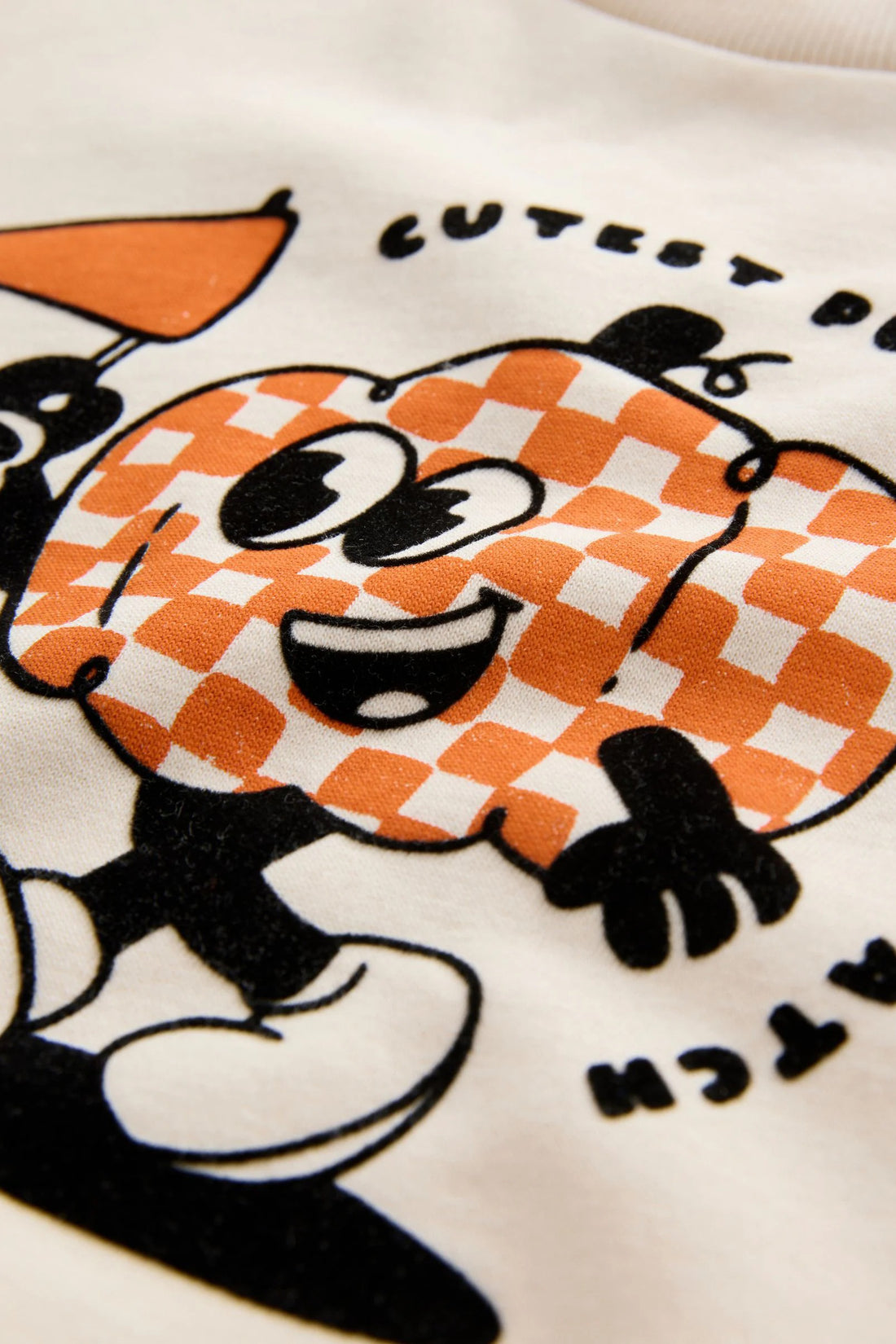 PTex Fashion cream relaxed-fit kids’ sweatshirt with pumpkin graphic, front flat lay